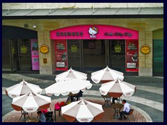 Mall of the World, Guangzhou's largest underground shopping mall, and one of the newest. It has open outdoor plazas under street level, with escalators down from Zhujiang New Town.